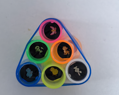 The recalled Oitnlaughter finger lights project six animal designs (tiger, elephant, rabbit, panda, butterfly and duck)